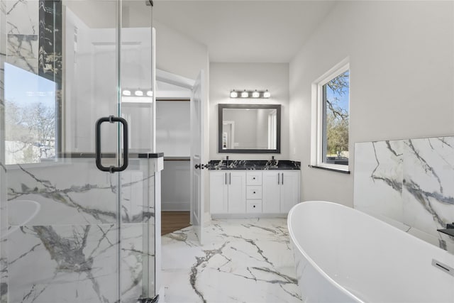 bathroom with vanity and plus walk in shower