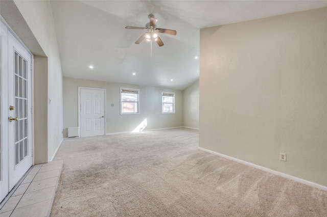 unfurnished room featuring light carpet, baseboards, a ceiling fan, vaulted ceiling, and recessed lighting