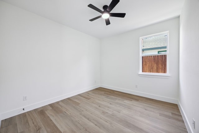 unfurnished room featuring ceiling fan and light wood-type flooring