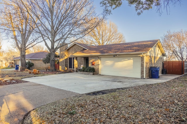 ranch-style house featuring a garage