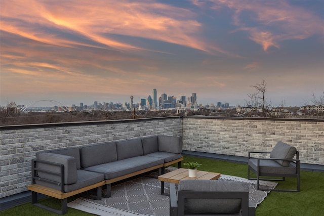 patio terrace at dusk with outdoor lounge area