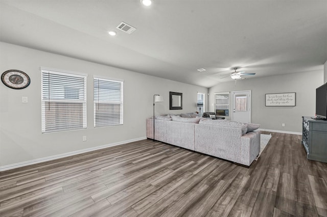 unfurnished living room with ceiling fan, wood-type flooring, and lofted ceiling