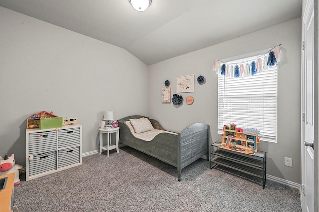 carpeted bedroom featuring vaulted ceiling