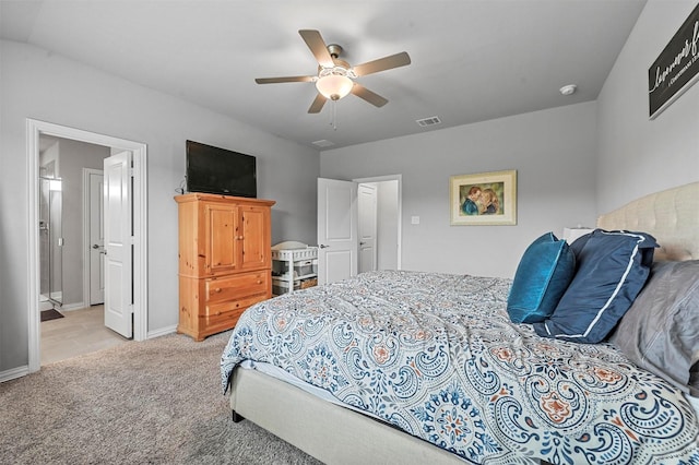 bedroom featuring light colored carpet and ceiling fan