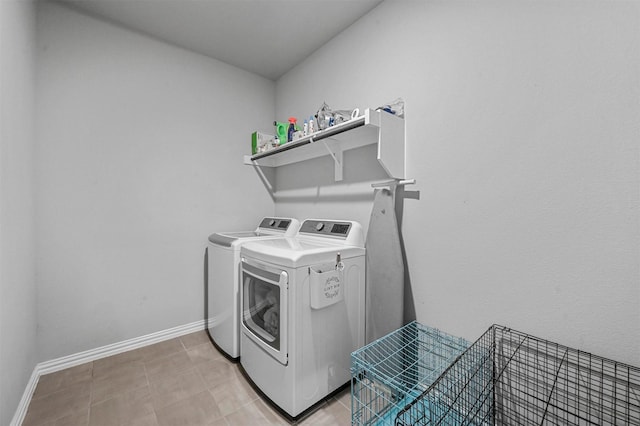 laundry room with independent washer and dryer