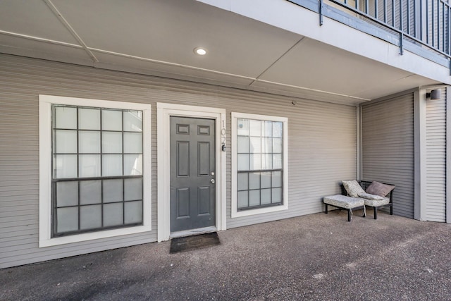 entrance to property with a patio area