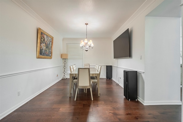 dining space featuring dark hardwood / wood-style flooring, ornamental molding, and a chandelier