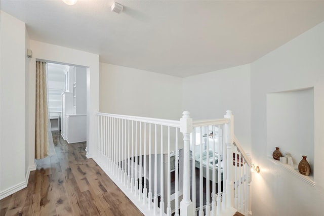 hallway featuring hardwood / wood-style flooring