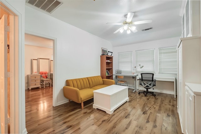 office area featuring ceiling fan and light wood-type flooring