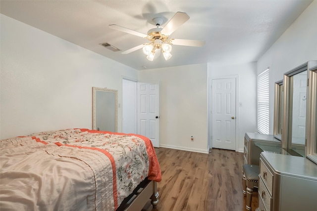 bedroom featuring ceiling fan and light wood-type flooring