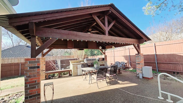 view of patio with a gazebo and area for grilling