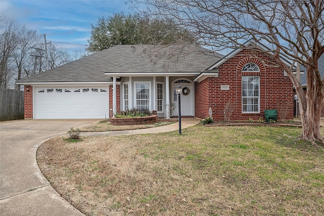 view of front of house with a garage and a front yard