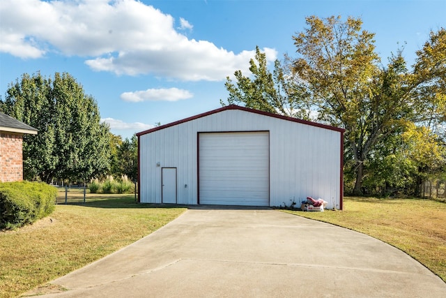 garage with a lawn