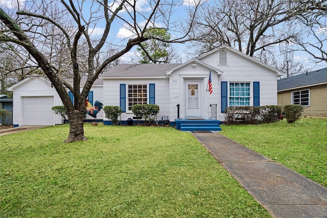 ranch-style house with a garage and a front yard