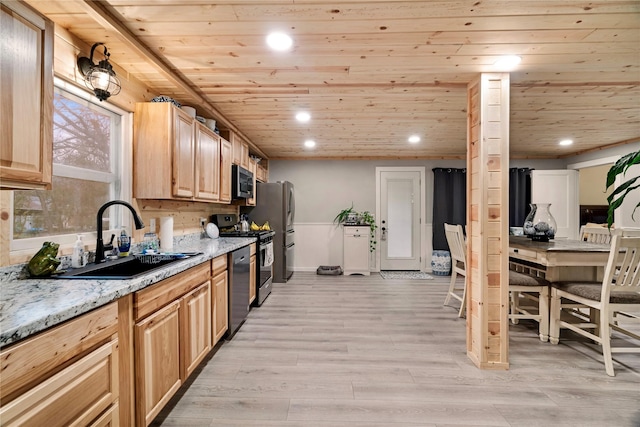 kitchen with light stone counters, sink, wooden ceiling, and appliances with stainless steel finishes