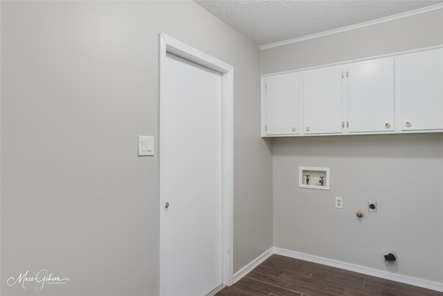 laundry room with hookup for a washing machine, cabinets, dark hardwood / wood-style floors, hookup for a gas dryer, and hookup for an electric dryer