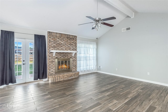 unfurnished living room with high vaulted ceiling, a brick fireplace, dark hardwood / wood-style flooring, ceiling fan, and beam ceiling