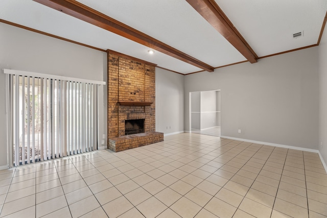 unfurnished living room featuring beamed ceiling, ornamental molding, a fireplace, and light tile patterned floors