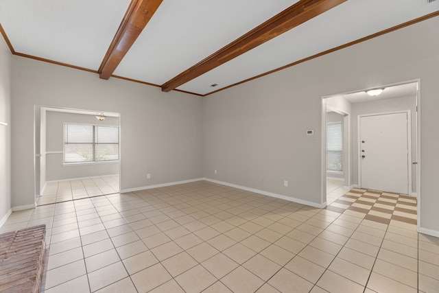 empty room with beamed ceiling, ornamental molding, and light tile patterned floors