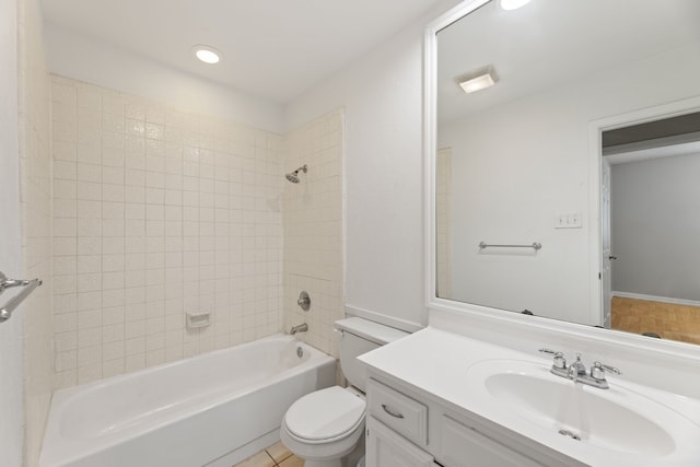 full bathroom with vanity, toilet, and tiled shower / bath