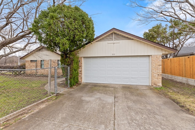 view of front of property with a garage and an outdoor structure