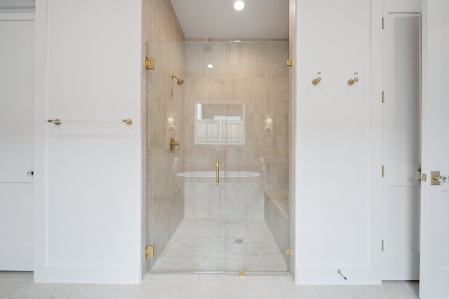 bathroom featuring an enclosed shower