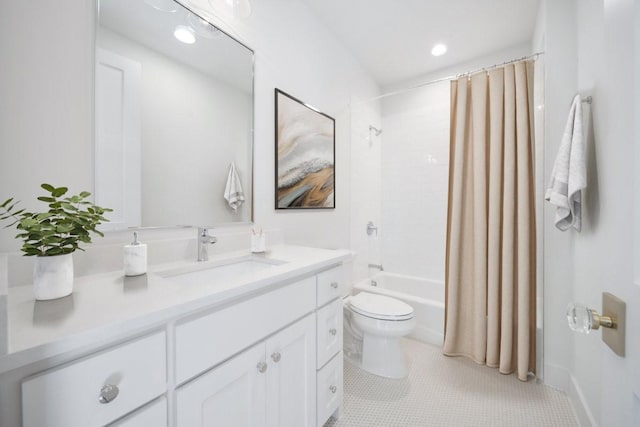 full bathroom featuring vanity, toilet, tile patterned flooring, and shower / tub combo