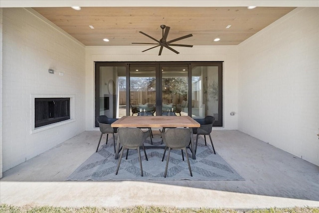 view of patio featuring ceiling fan