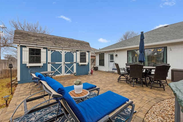 view of patio with a shed