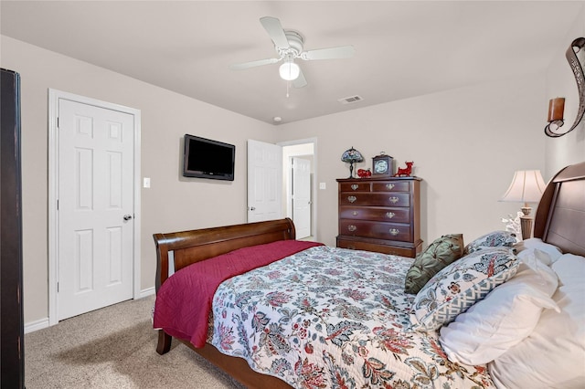 carpeted bedroom featuring ceiling fan