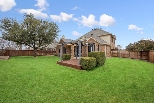 rear view of property featuring a wooden deck, a lawn, and a pergola