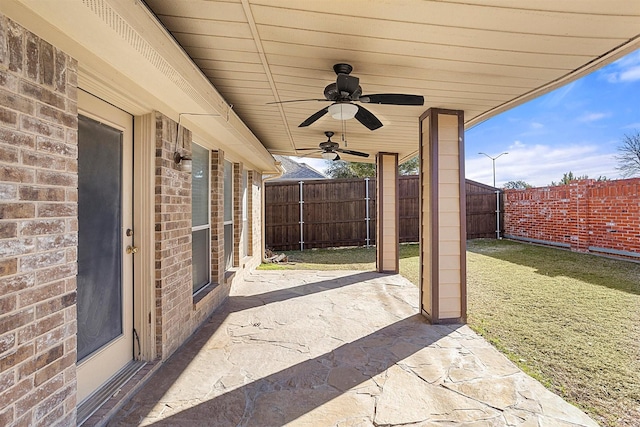 view of patio / terrace featuring ceiling fan