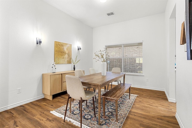 dining room featuring hardwood / wood-style flooring