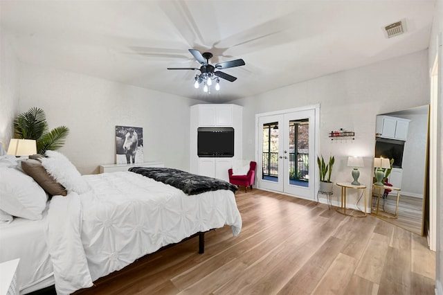 bedroom featuring french doors, ceiling fan, access to exterior, and light wood-type flooring