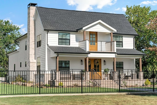 209 Mary Fitch Rd, Sherman, TX 75090 - view of front of property with a chimney, a balcony, roof with shingles, and a porch