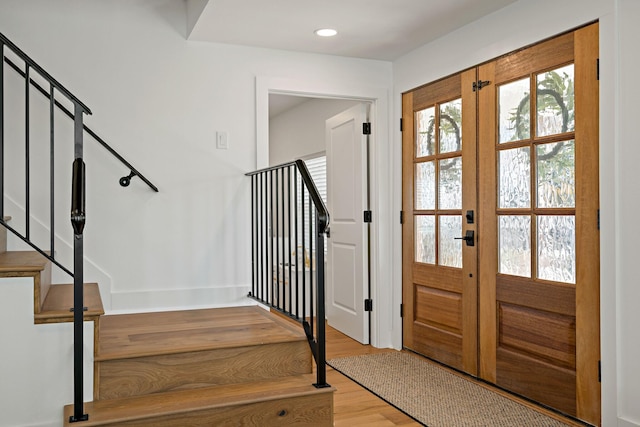 209 Mary Fitch Rd, Sherman, TX 75090 - entryway with light wood-style floors, stairway, baseboards, and recessed lighting