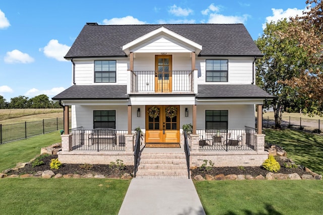209 Mary Fitch Rd, Sherman, TX 75090 - modern farmhouse style home with covered porch, a balcony, a shingled roof, and french doors