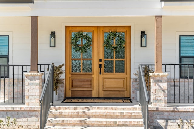 209 Mary Fitch Rd, Sherman, TX 75090 - entrance to property featuring covered porch and french doors