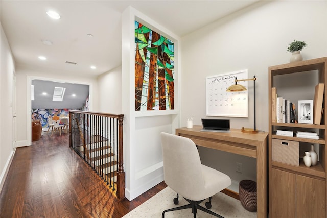 office space with dark wood-type flooring