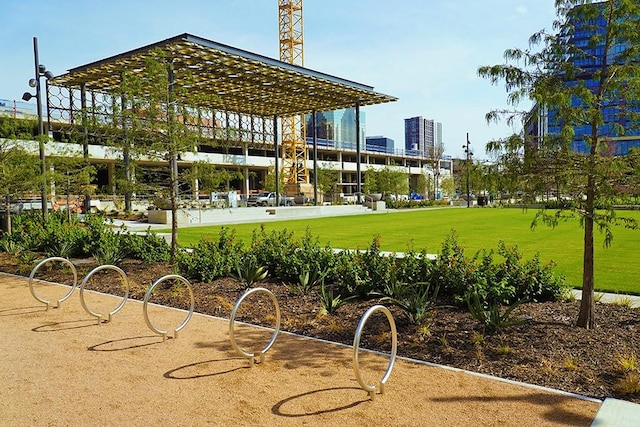 view of home's community with a yard