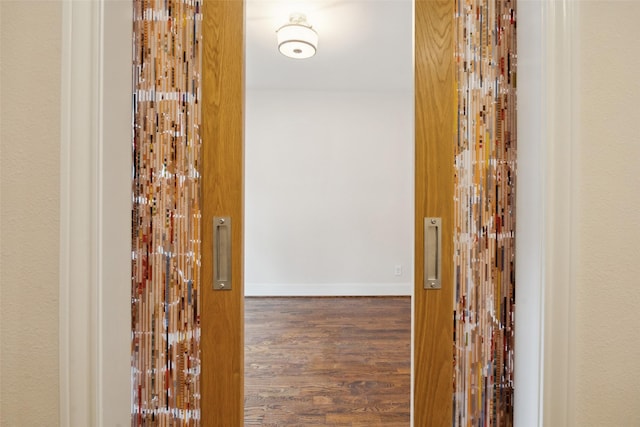 2134 Canton St, Dallas, TX 75201 - hall with baseboards and wood finished floors