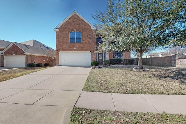 front facade with a garage and a front yard