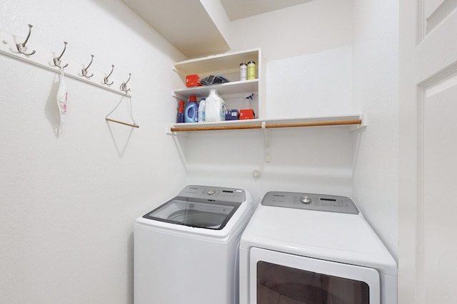 laundry room featuring separate washer and dryer