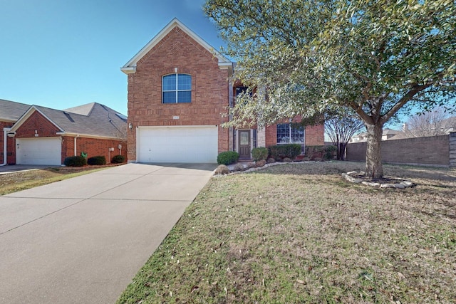 front facade featuring a garage and a front lawn