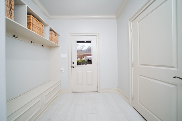 mudroom featuring ornamental molding