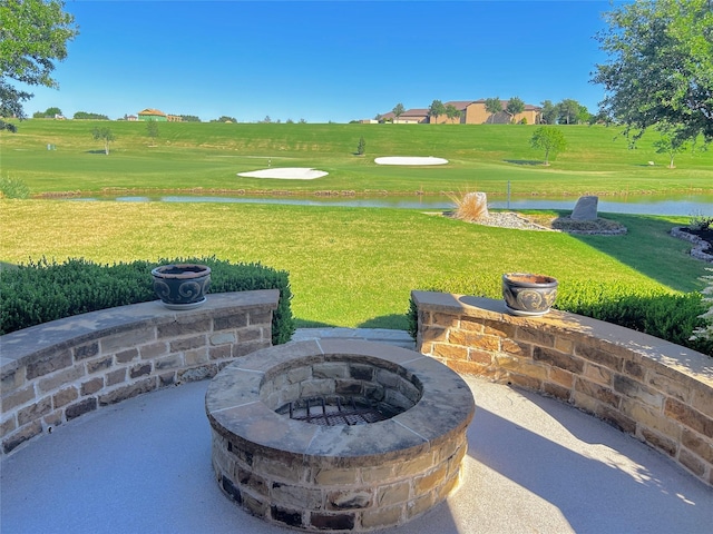 9113 Compton St, Denton, TX 76207 - view of patio featuring an outdoor fire pit, a water view, and golf course view