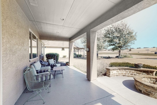 9113 Compton St, Denton, TX 76207 - view of patio with a fire pit