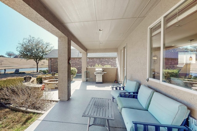 9113 Compton St, Denton, TX 76207 - view of patio with an outdoor living space