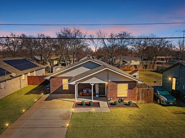 view of front of house with a lawn