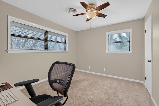 office featuring light carpet and ceiling fan